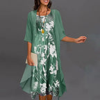 Chic Three-Quarter Sleeve Dress with Elegant Floral Design