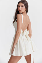 Stellar Grace: The White Bow Dress